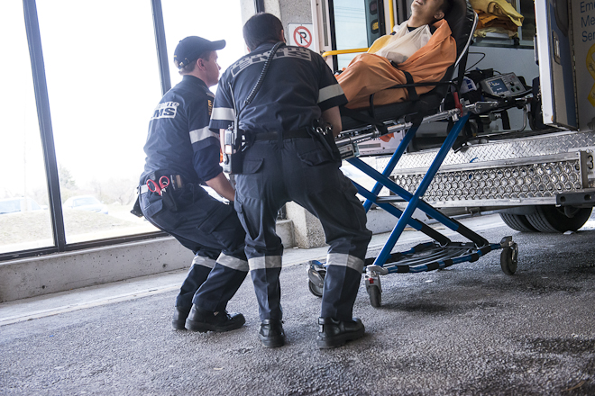 Paramedics lift patient