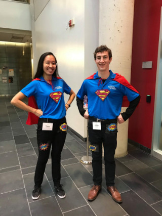 Two students in Superman-style costumes