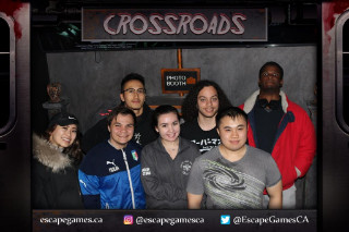 7 students in photo: labelled 'Crossroads Photo Booth'