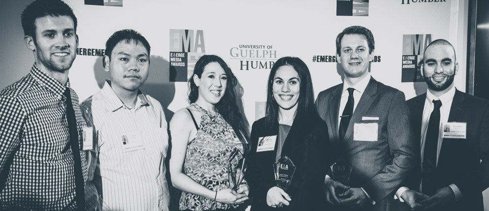 Group photo of Emerge Media Awards winners. From left to right: Nicholas Kattis, Alex Lai, Katie Wyatt, Jessica Pollock, Julian Uzielli, and Matthew Rovet.