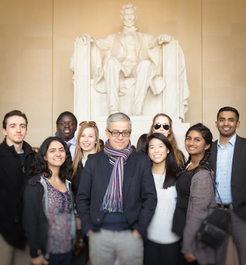 The Agora Fellows stand in front of the Lincoln Memorial
