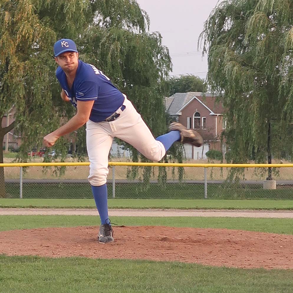 Justin Medak throws a pitch in his baseball league.