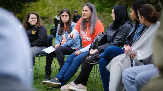 Dr. Nikki Martyn talks with students in a talking circle