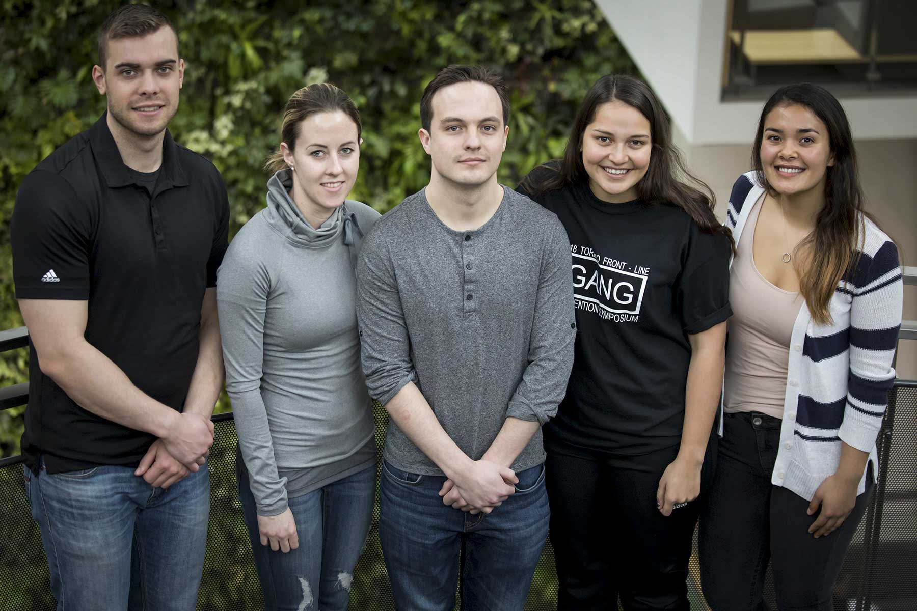 Five of the students involved in gang research pose for a photo