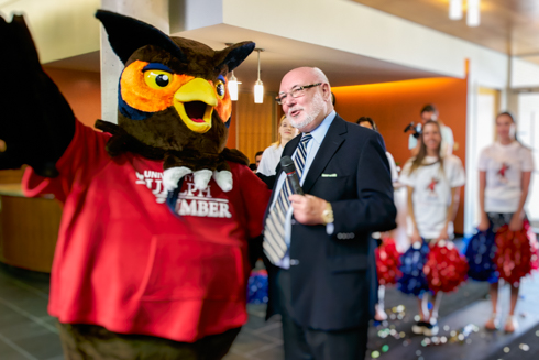 UofGH mascot Swoop with Vice-Provost John Walsh