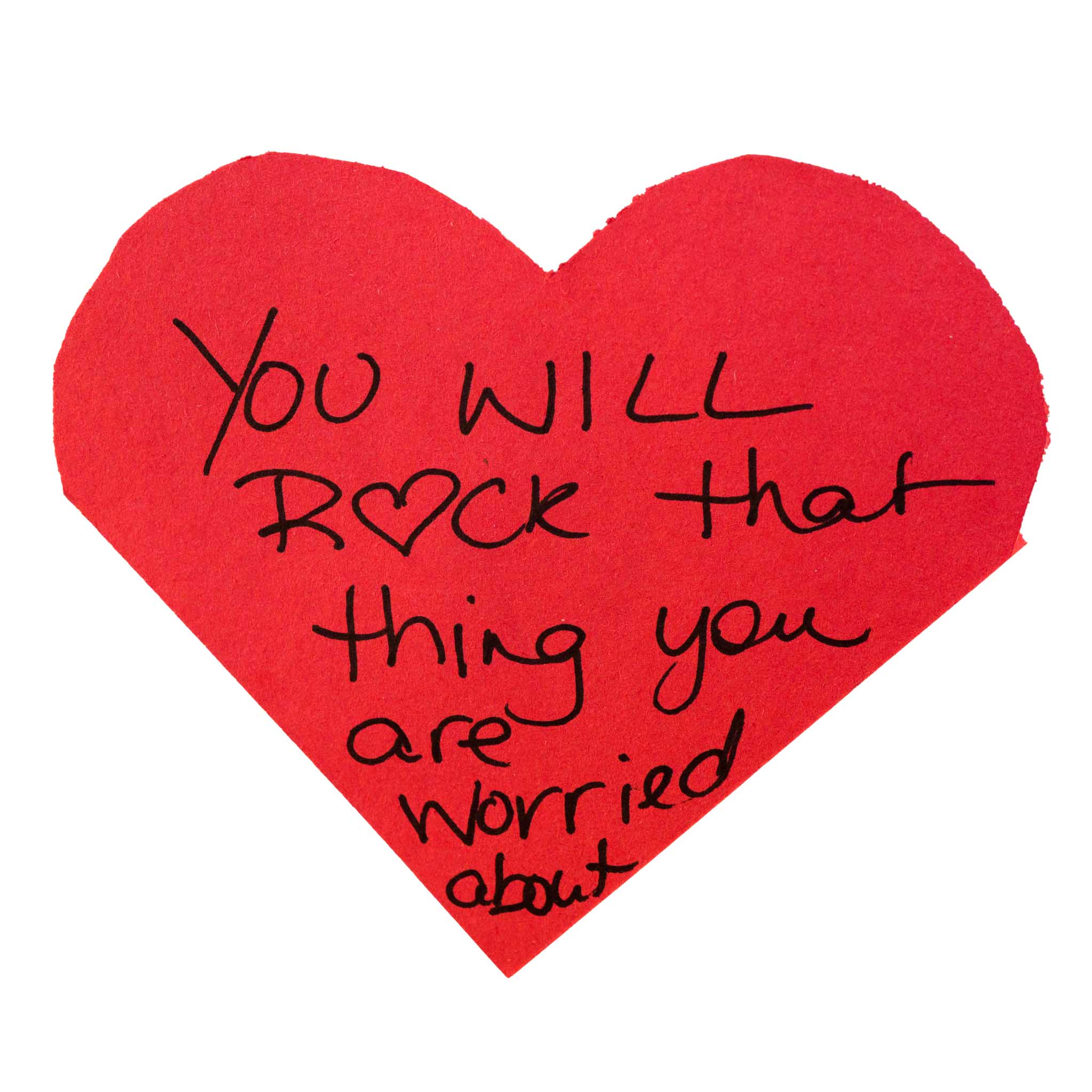 Paper heart with message reading: you will rock that thing you are worried about