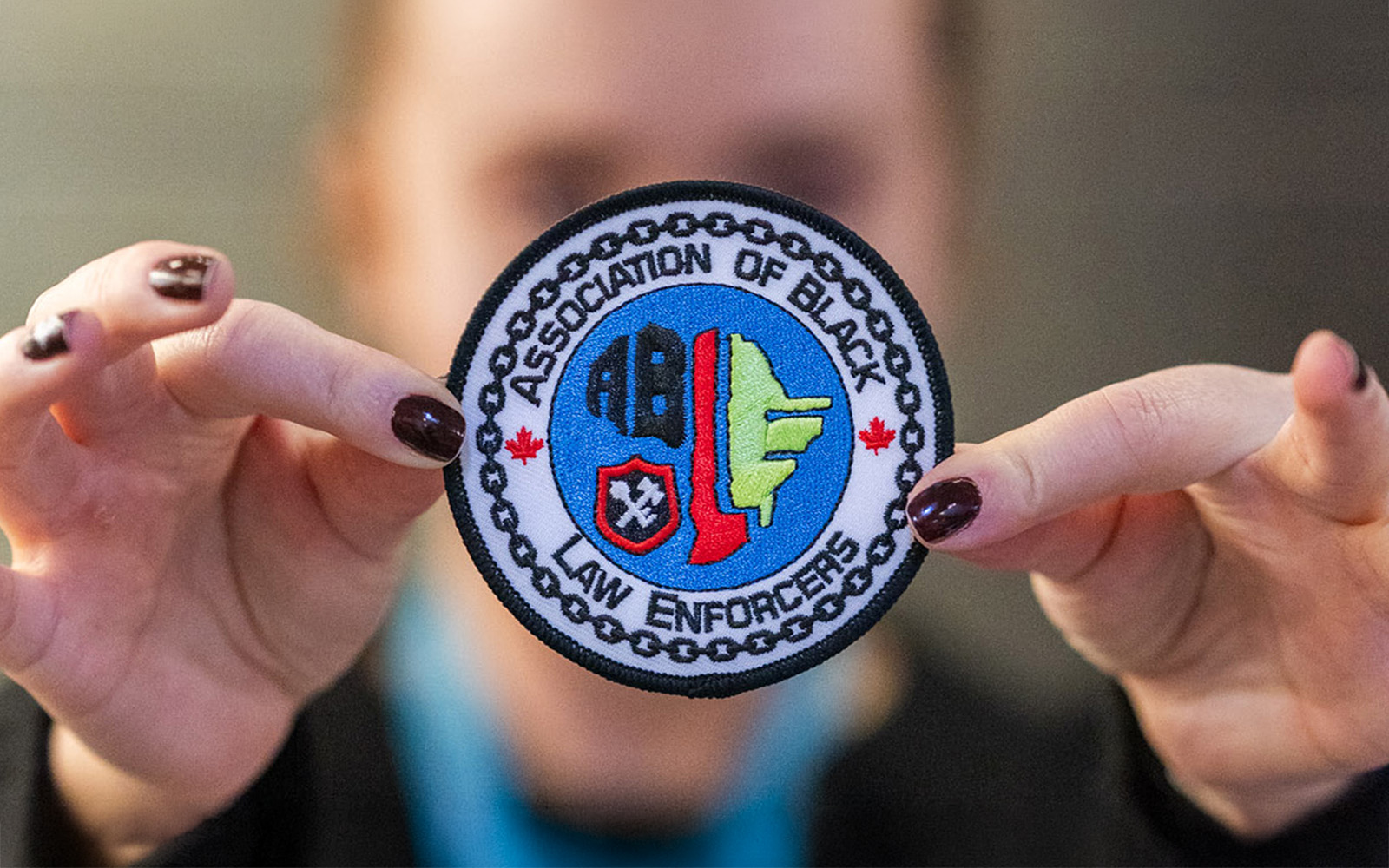 person holding badge