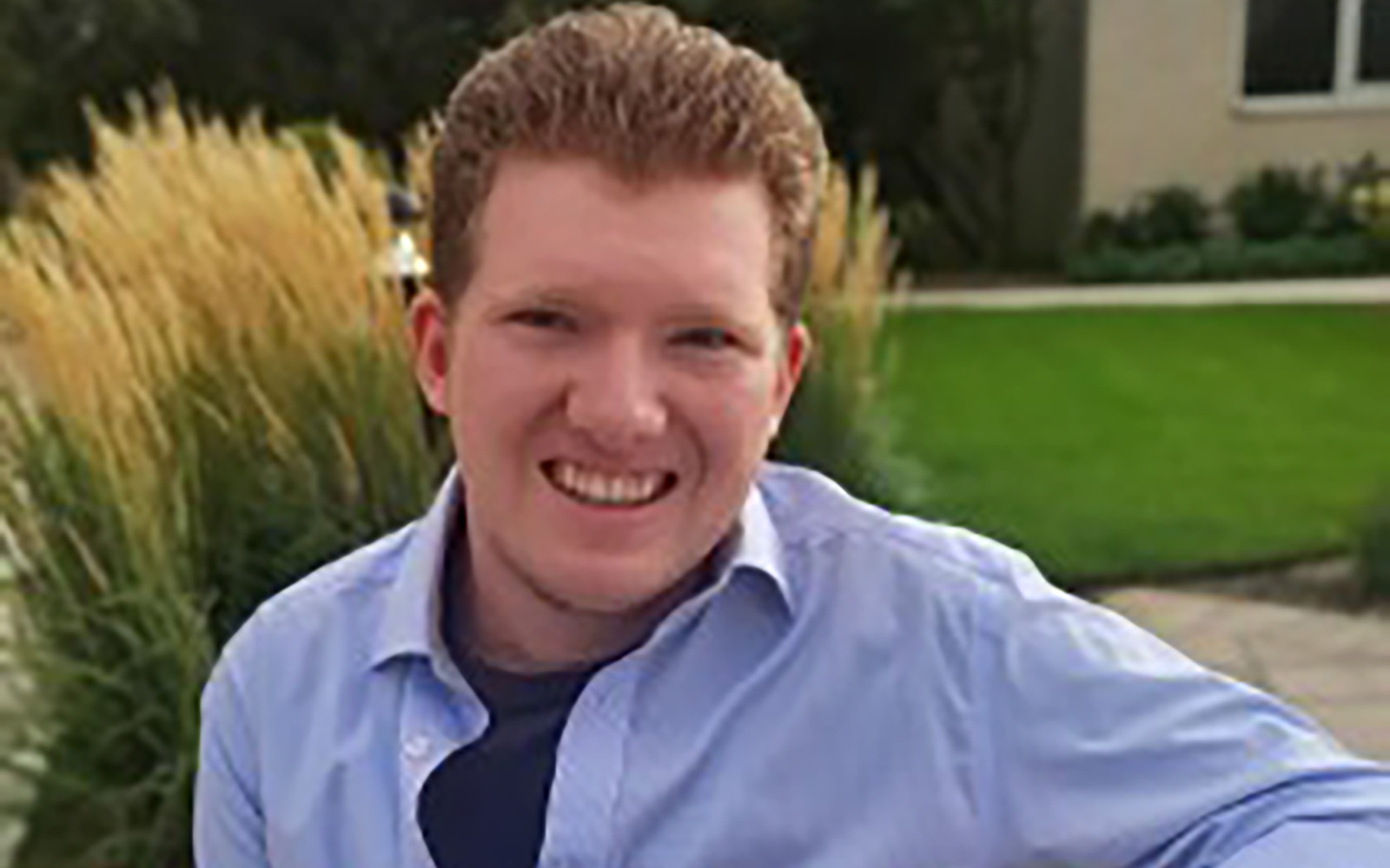 man in blue shirt