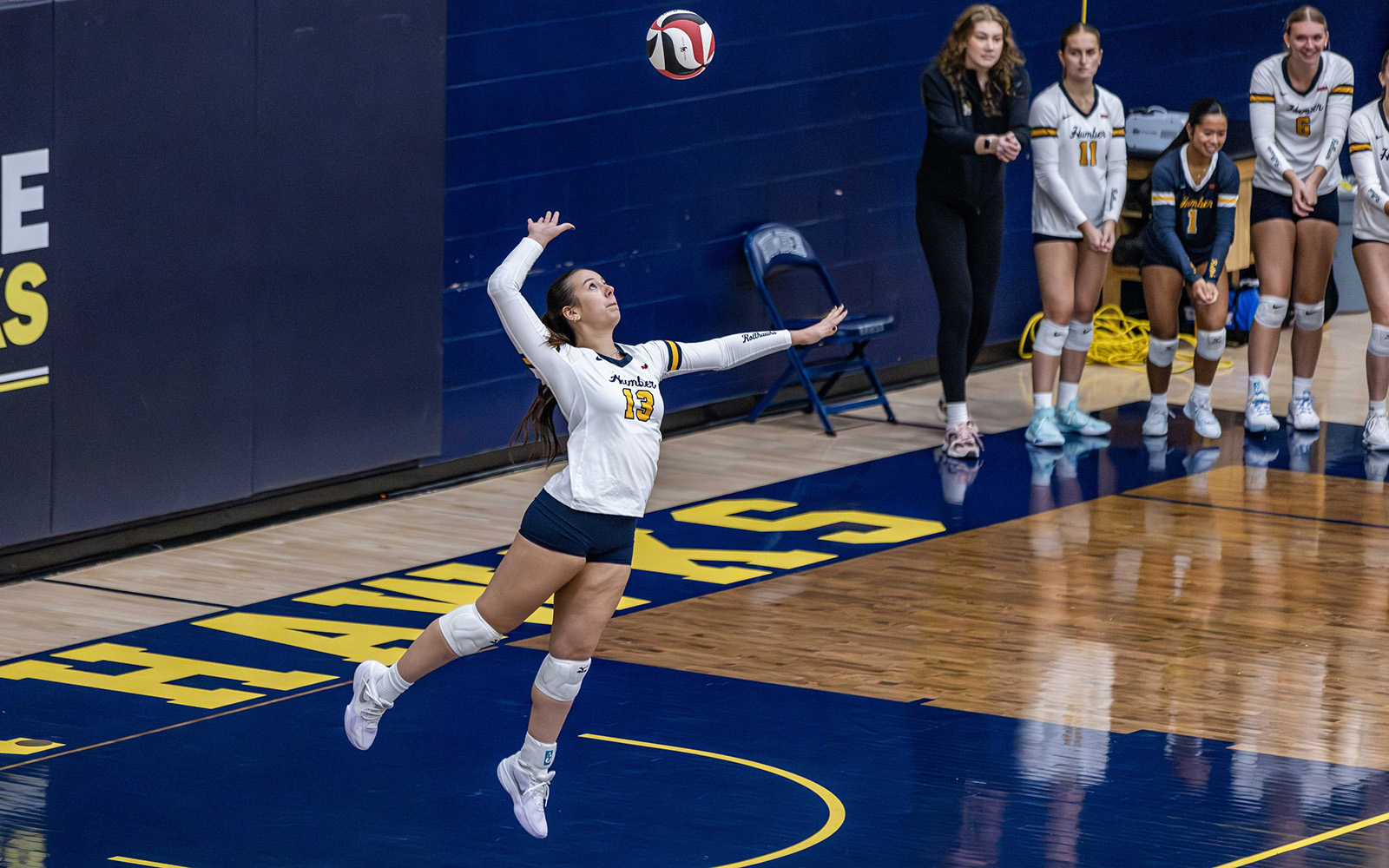 woman hitting volleyball
