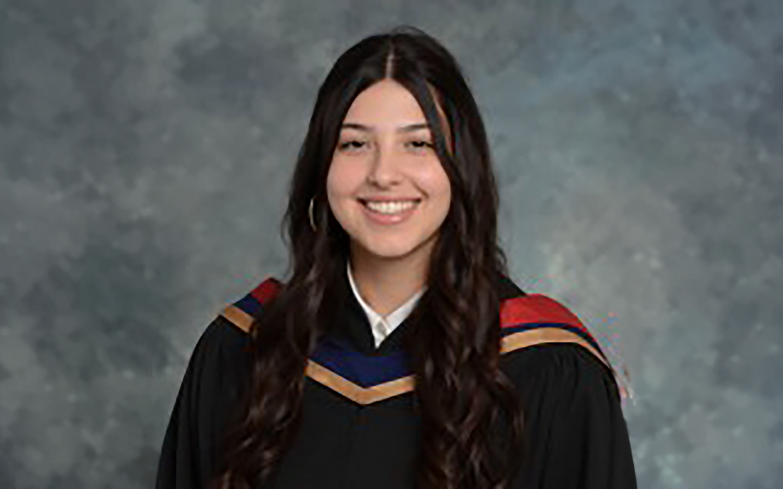 student in graduation gown