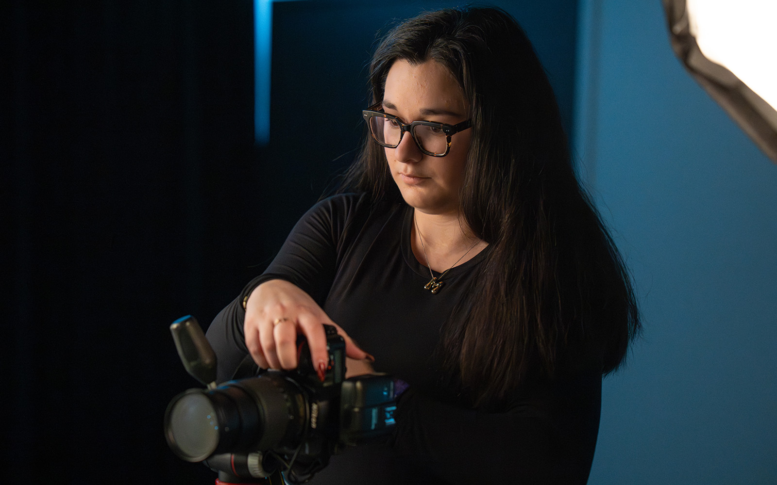 female student with camera set up
