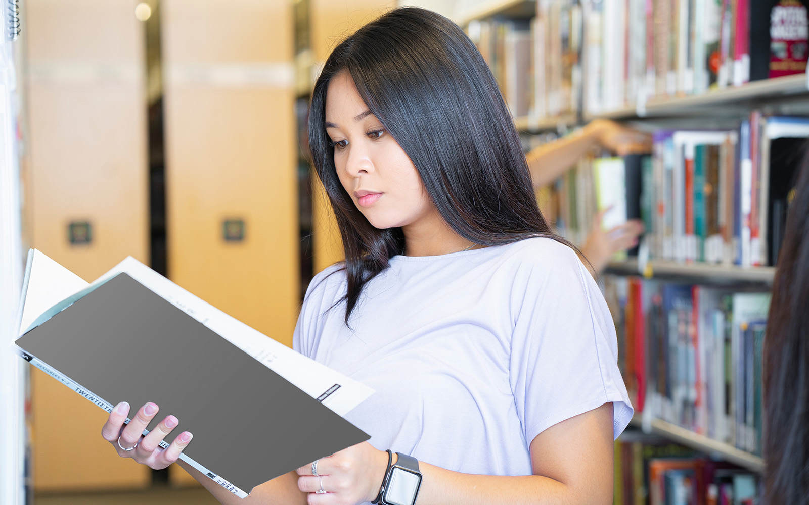 student reading a book