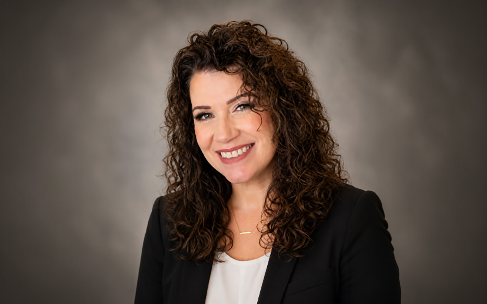 woman with brown curly hair