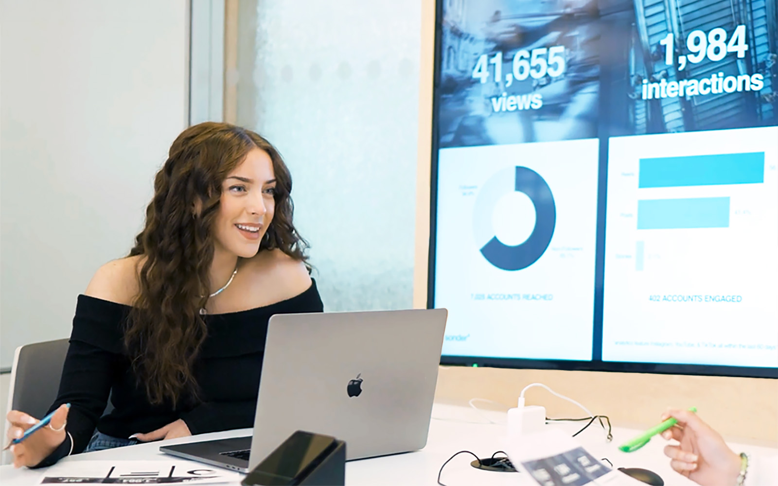Female student looking a social media stats