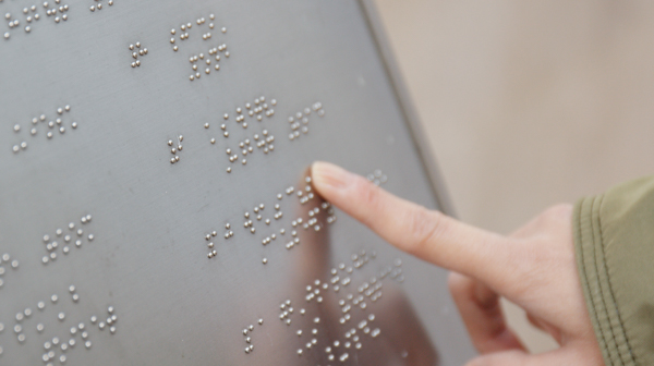 a finger on braille