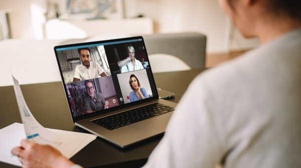 Student uses laptop for video conference