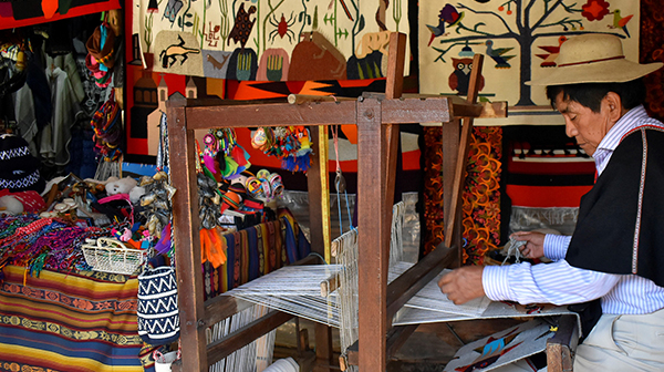 An artisan working on handmade goods in Ecuador