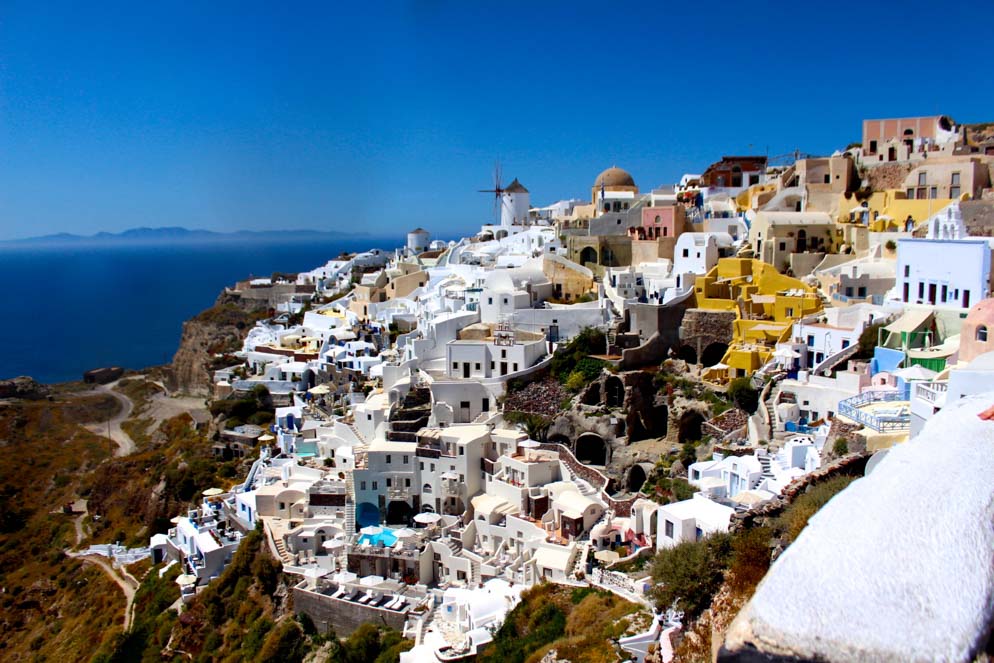 Photo of white and blue Greek houses and seascape