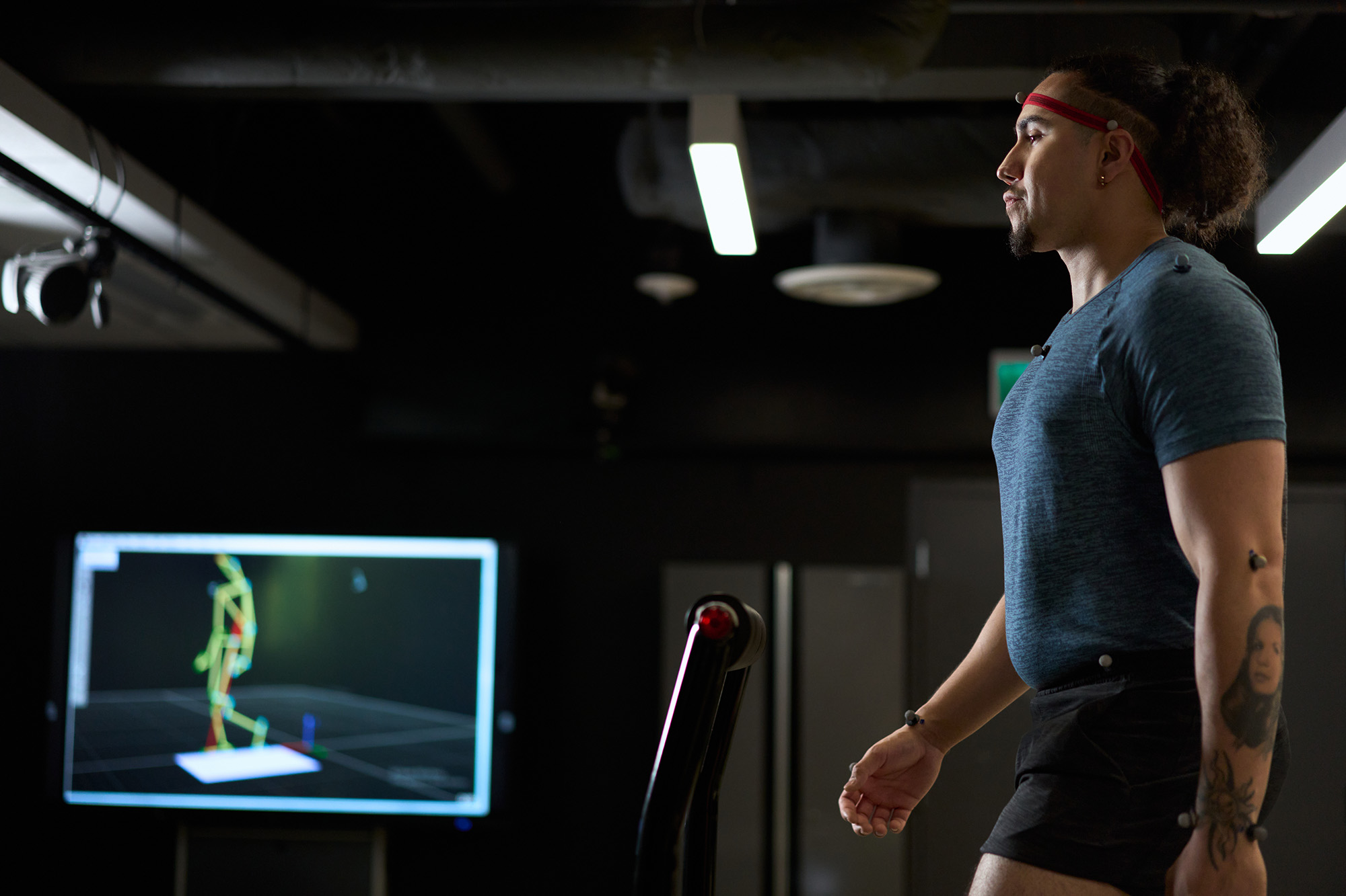 Student walking on treadmill