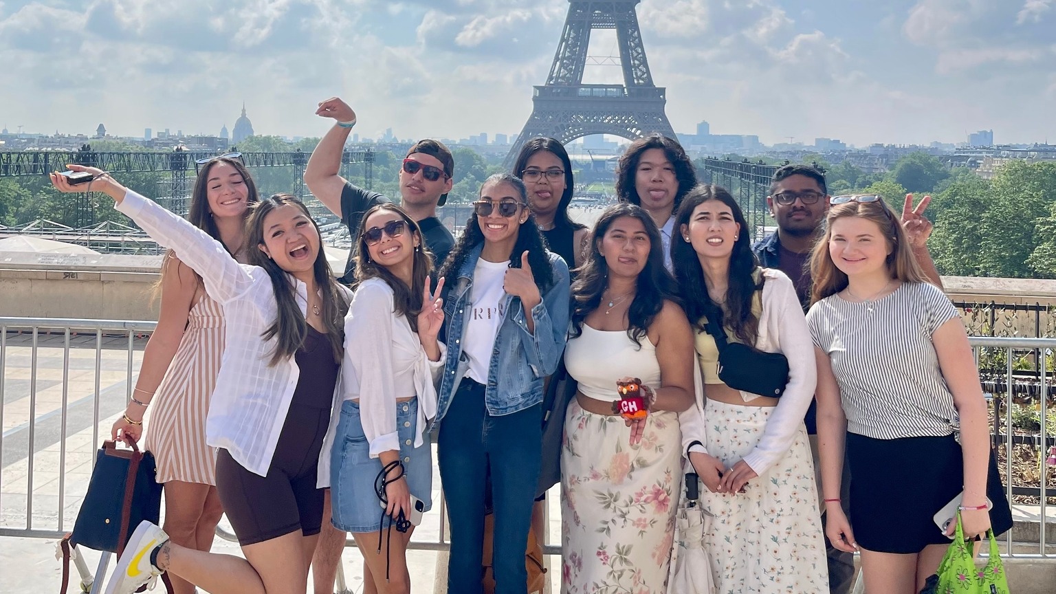 A group of students with the Eiffel Tower in the background