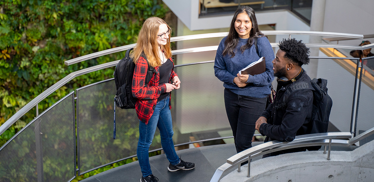Transfer Applicants Three students on the spiral staircase