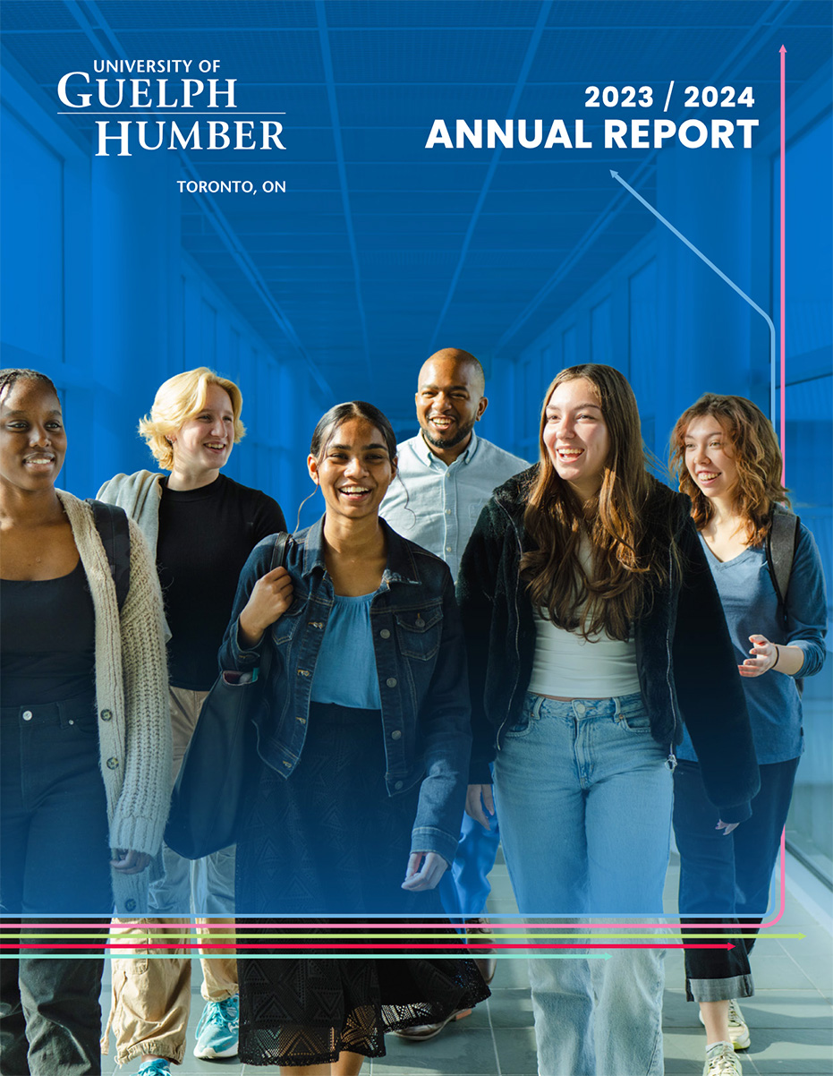 Group of students walking across bridge
