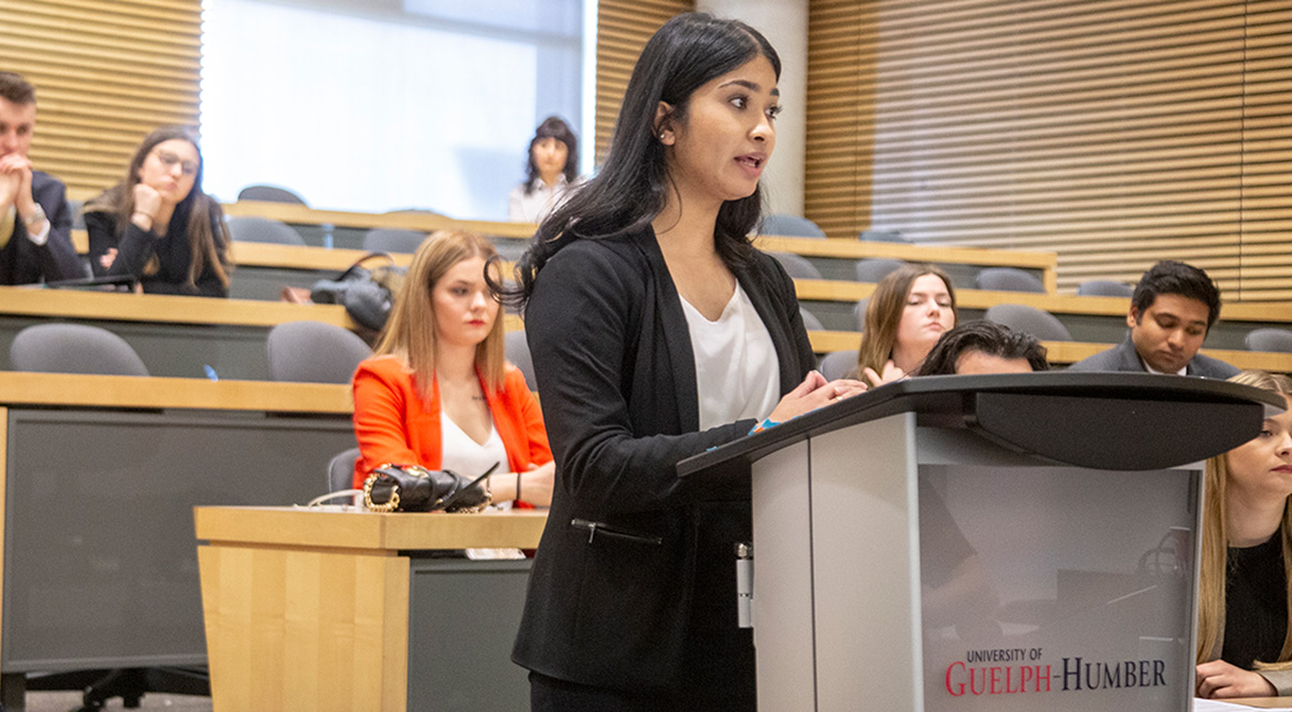 Moot court female student at podium
