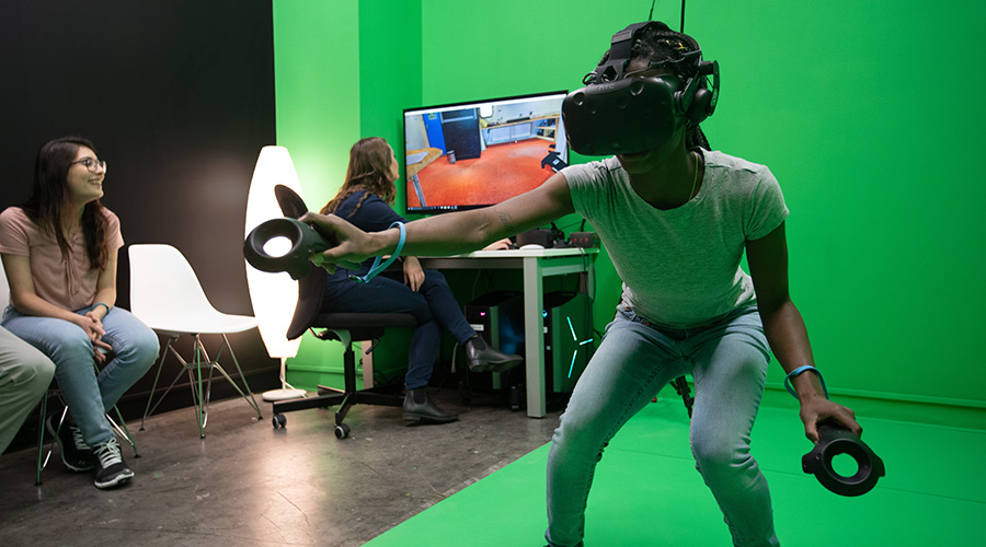 VR Studio student wearing virtual reality headset