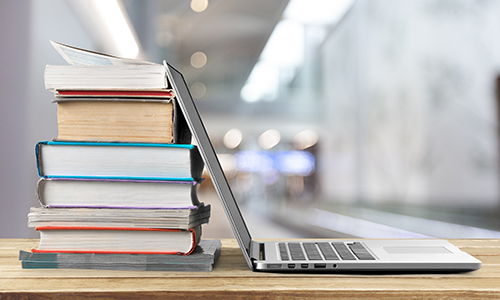 Books and computer on desk