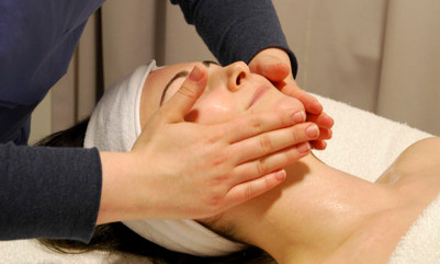Hands around woman's face