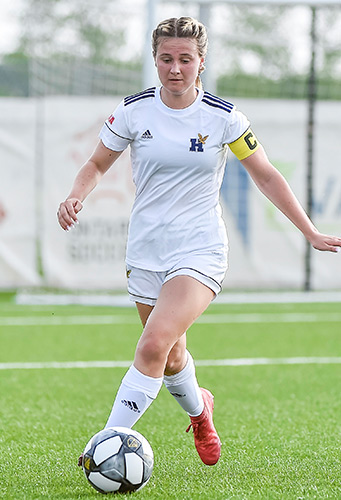 Rebecca playing soccer