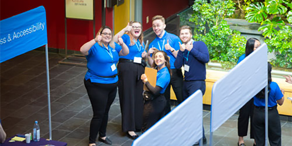 Student A group of 5 START leaders give thumbs up in preparation for Program Preview Day