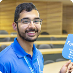 Man holding tour sign