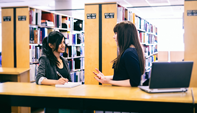 Students working in the library