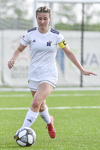 Rebecca playing soccer