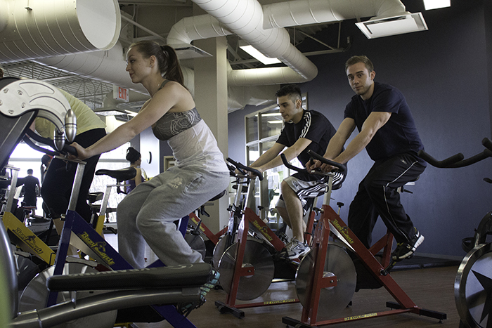 Students on stationary bikes