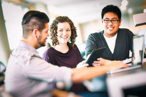 Students sitting at a table, studying