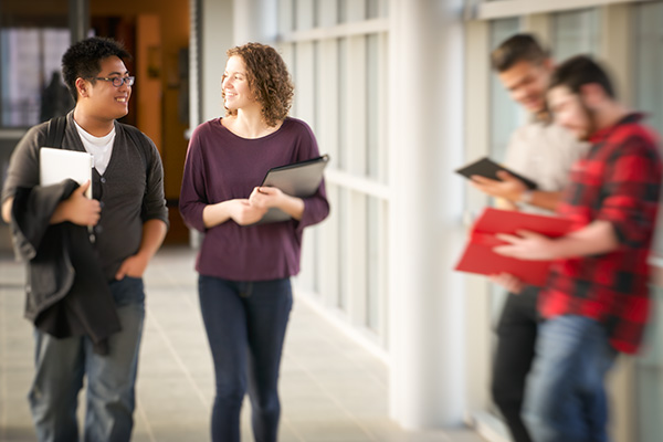 students walking in a hallway