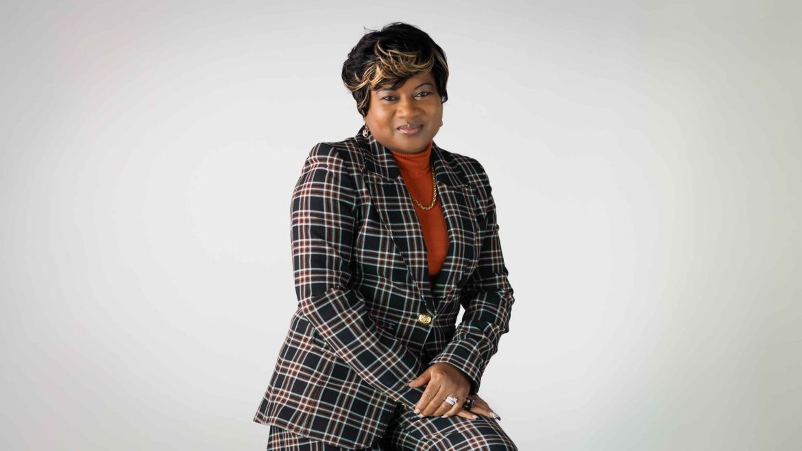 Woman wearing plaid suit