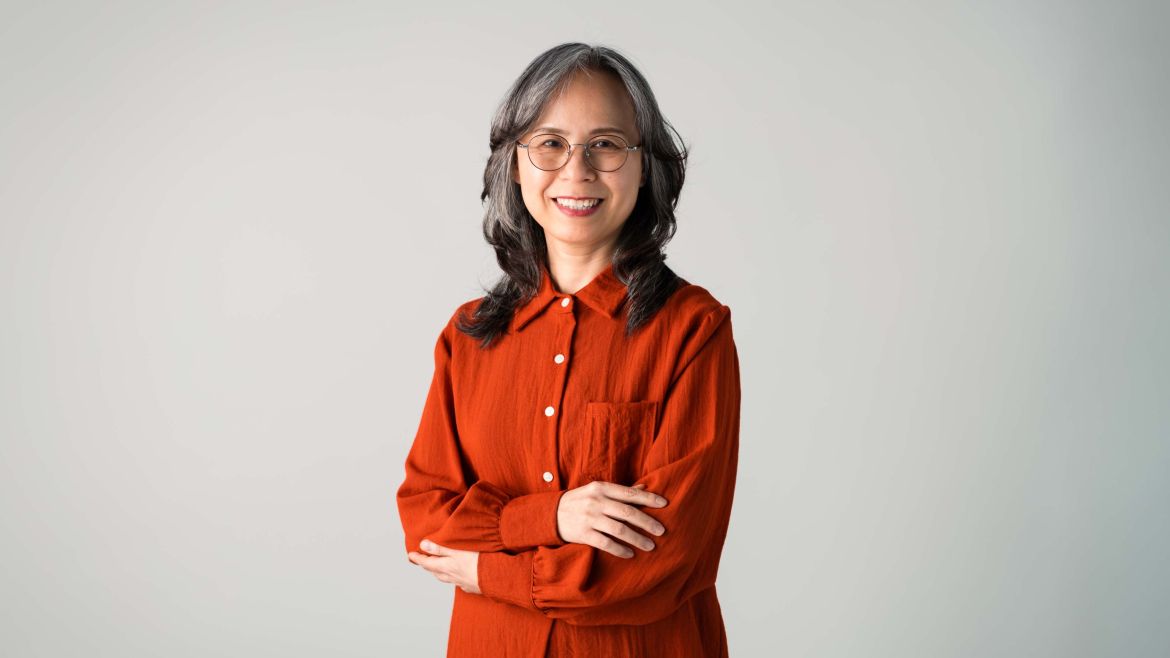 Woman wearing orange shirt