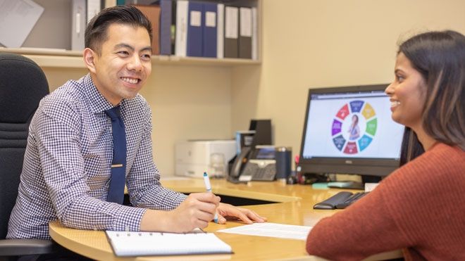 Advisor with student