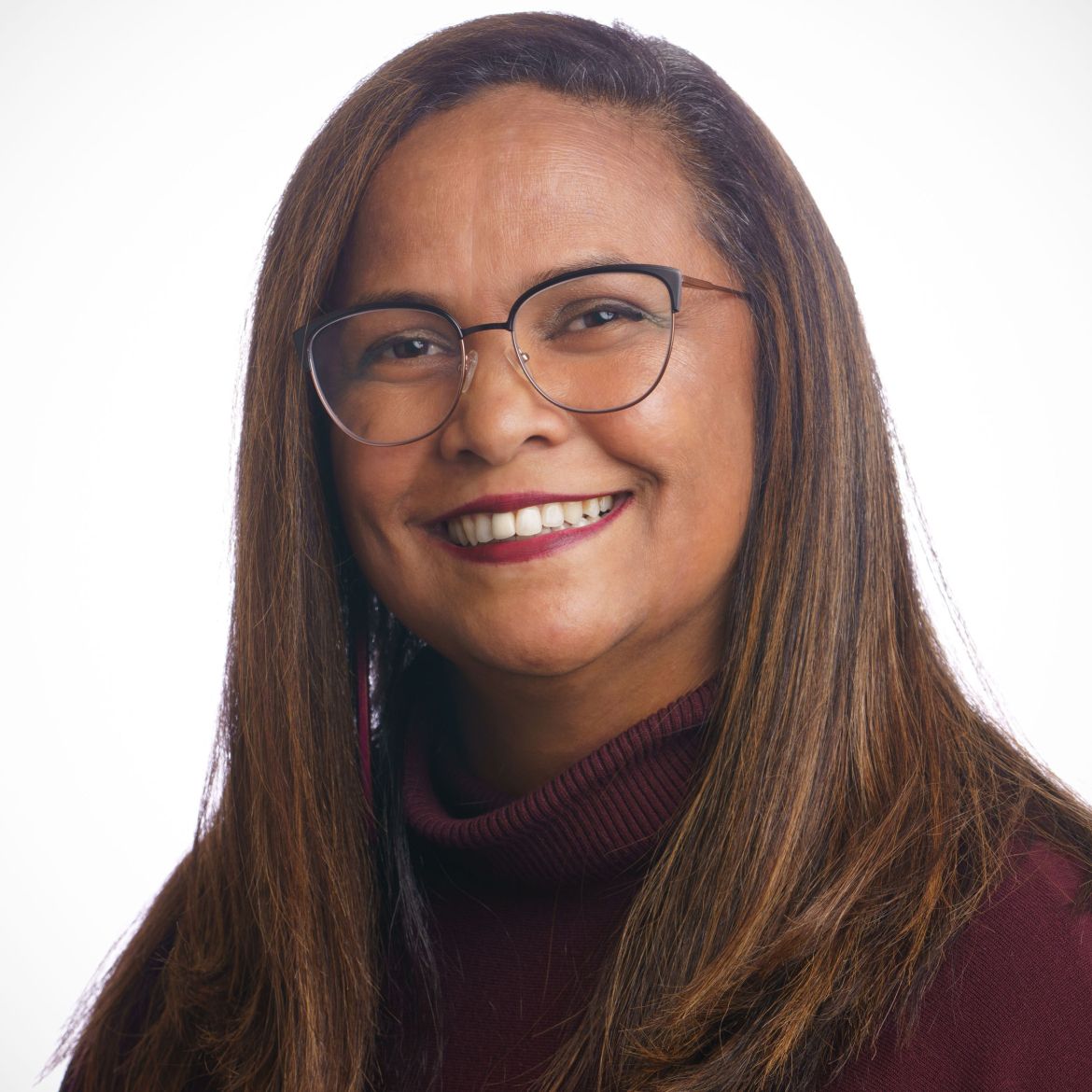 woman with glasses and straight brown hair