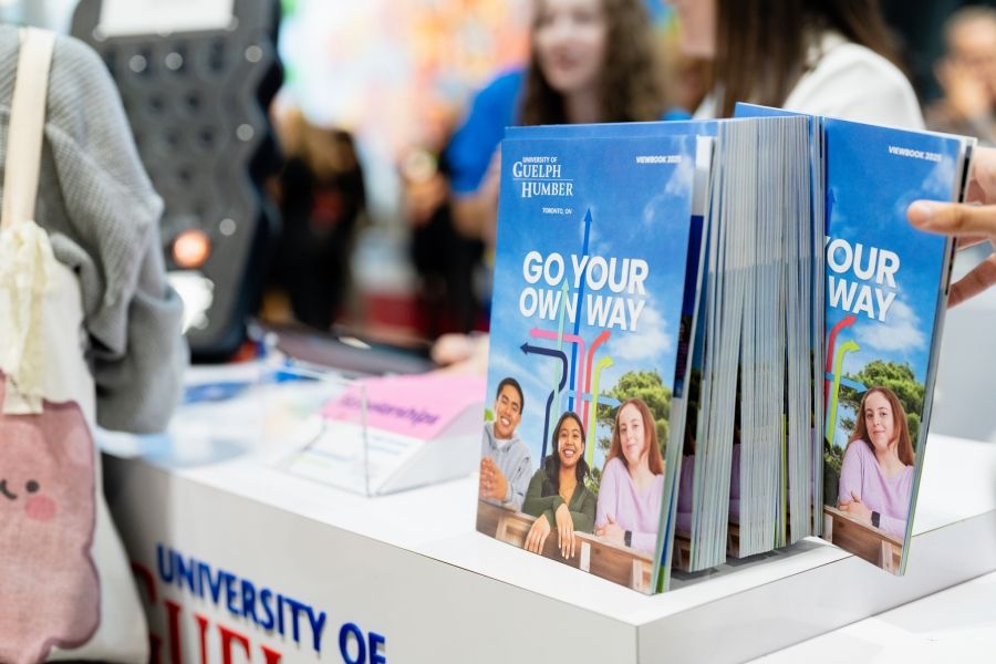 Table with Guelph-Humber booklets