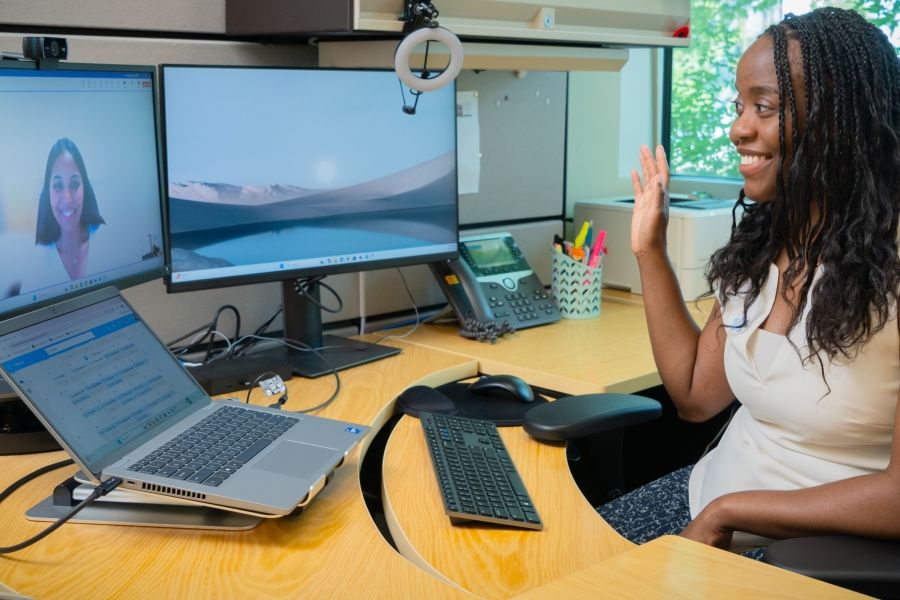 An Academic Advisor meets with a student online