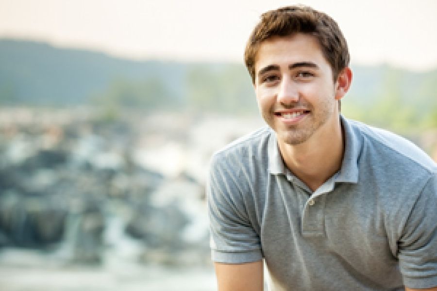 Student with city and mountains in background