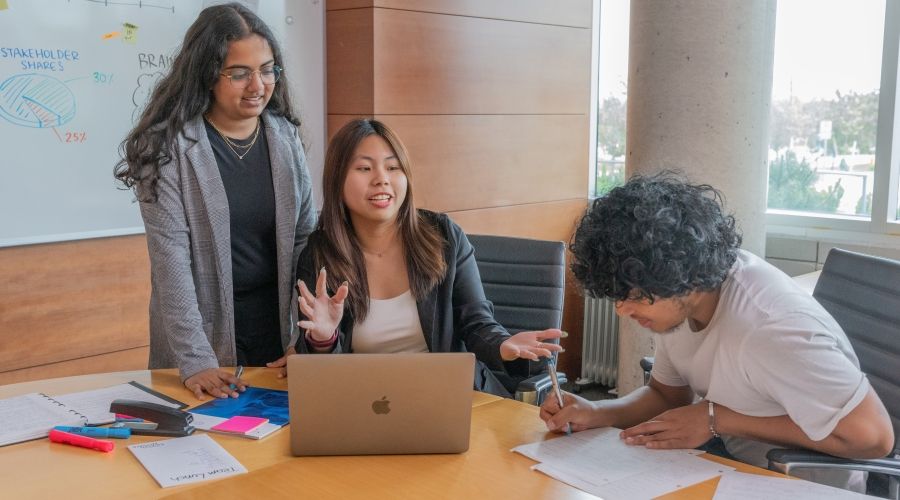Students working together at a desk
